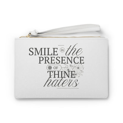 Smile In The Presence Of Thine Haters Clutch Bag